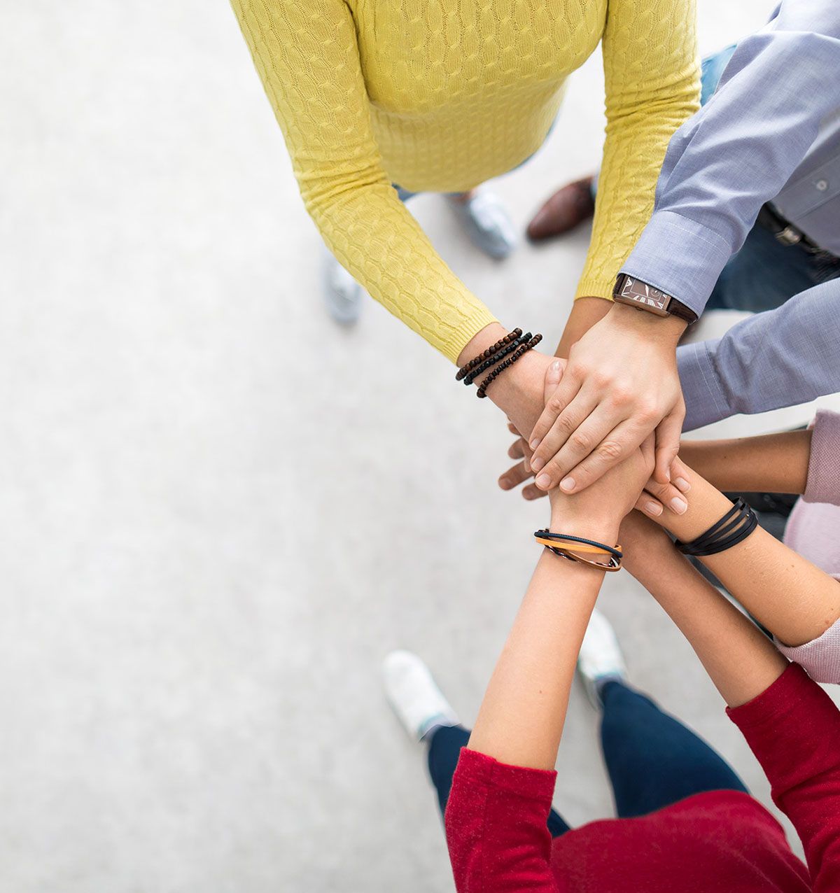 Arrowsmith Community Justice Society team with hands together